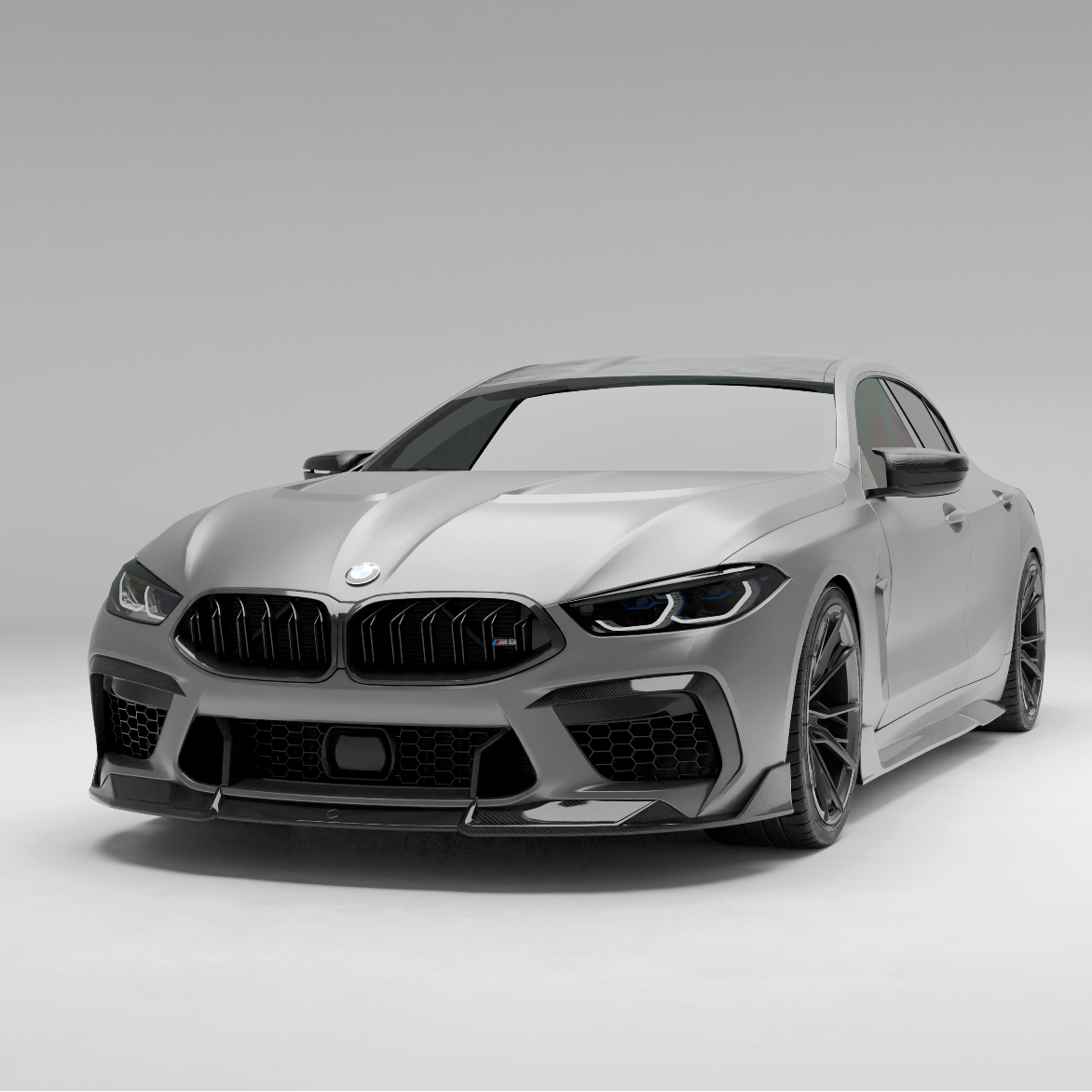 BMW car with a carbon fiber front lip on a white background