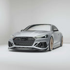 audi-car-with-a-carbon-fiber-front-lip-on-a-white-background