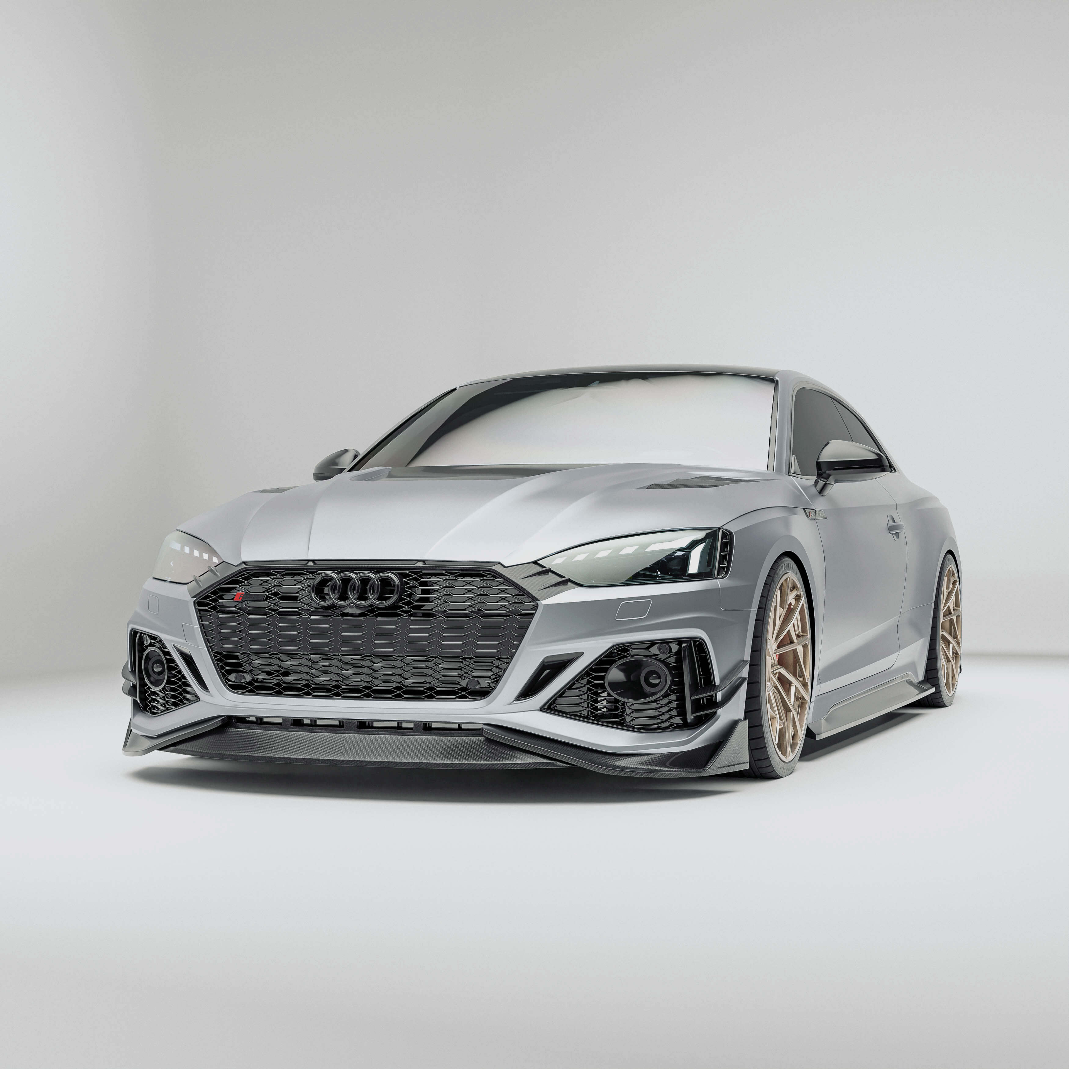 Audi car with a carbon fiber front lip a white background