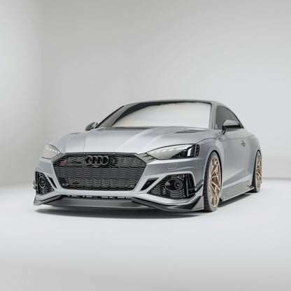 Audi car with a carbon fiber front lip a white background