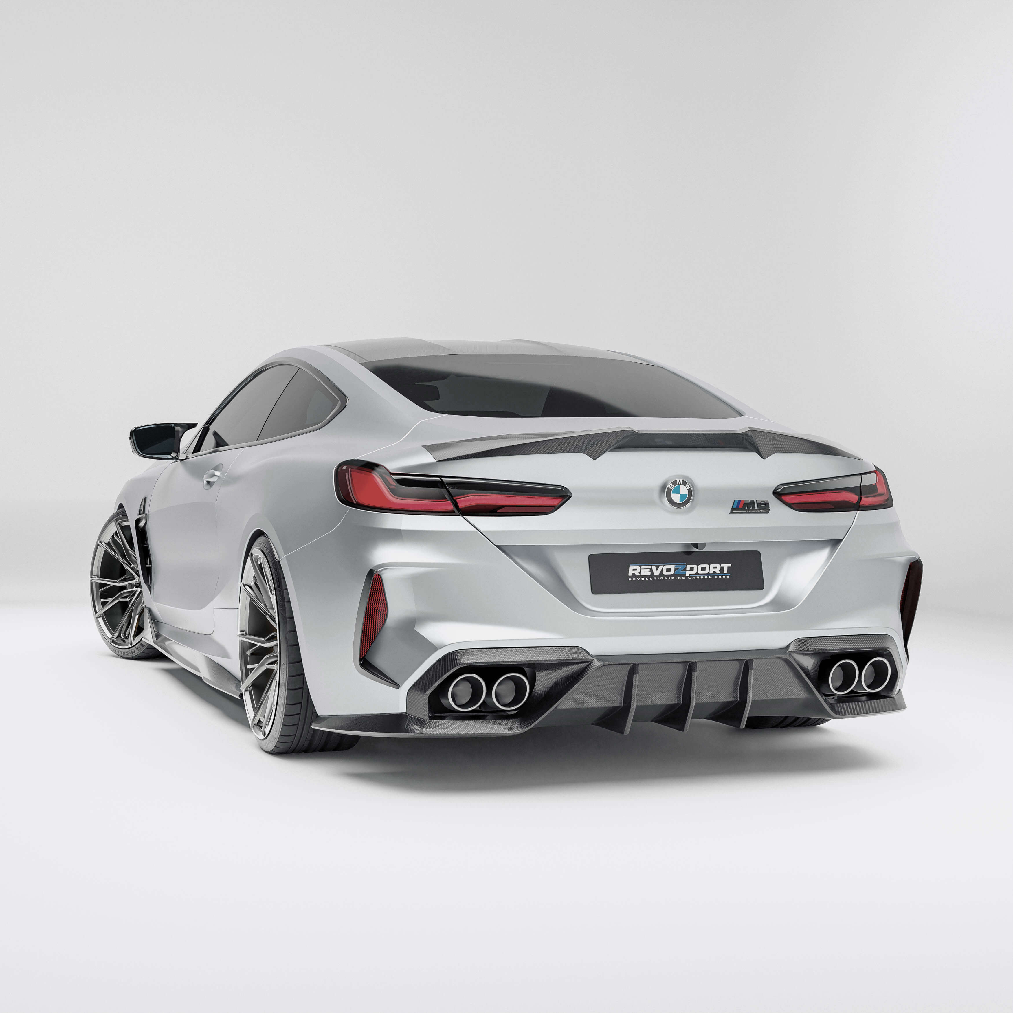 BMW M8 F92  with a carbon fiber rear diffuser full-view on a white background