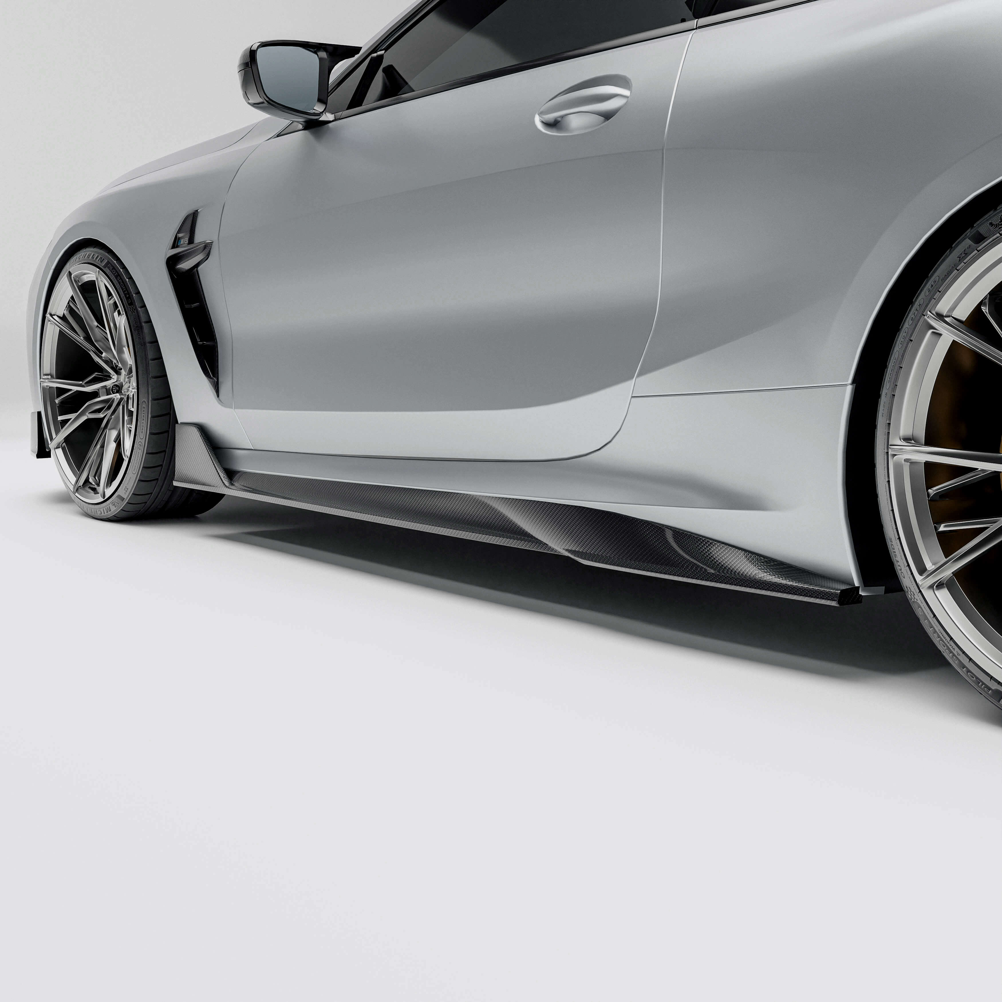 bmw-m8-f92--with-a-carbon-fiber-side-skirts-close-up-on-a-white-background