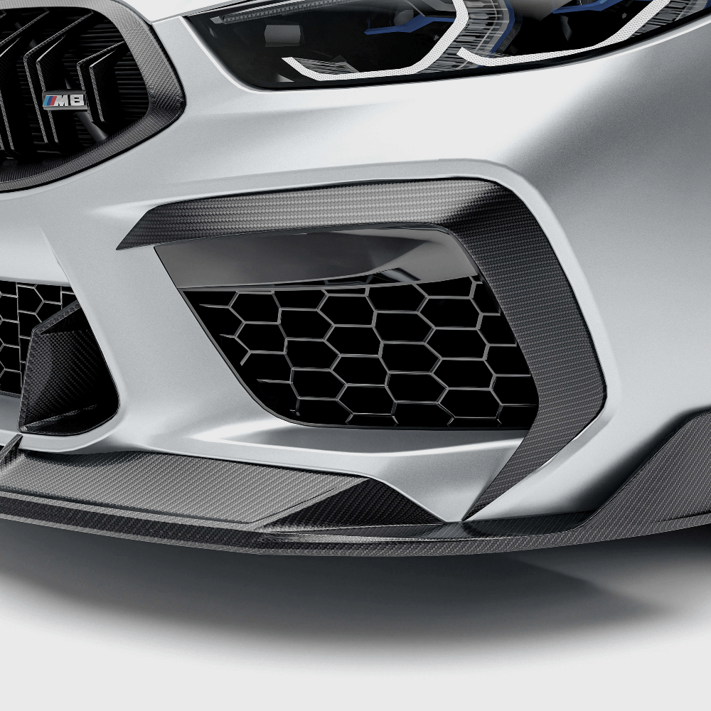BMW M8 F92  with a carbon fiber canards on a white background