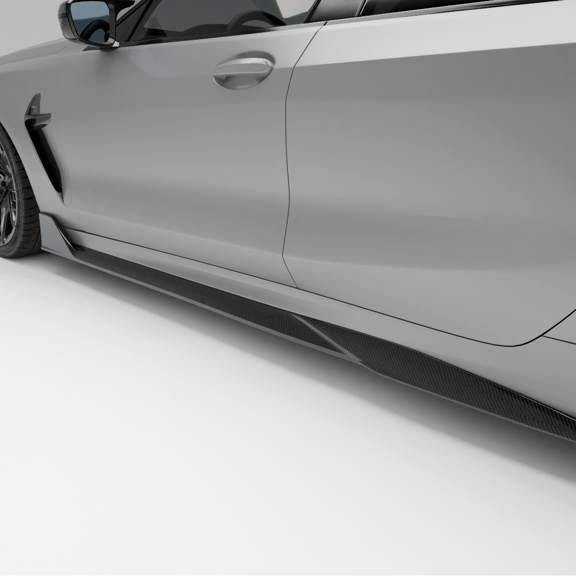 BMW car with a carbon fiber side skirts on a white background