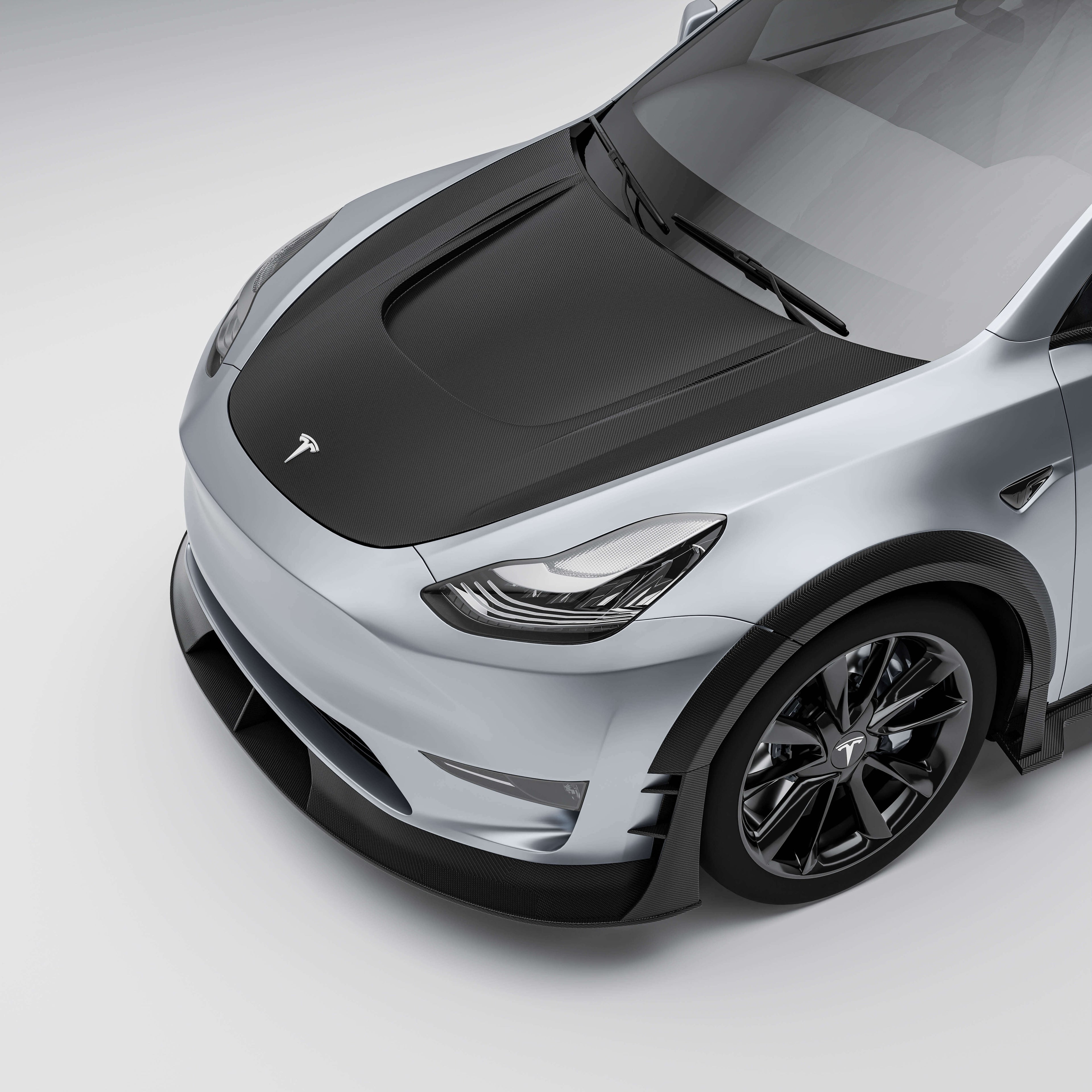 tesla-model-y-21-24-with-a-carbon-fiber-hood-on-a-white-background