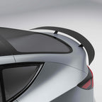 tesla-model-y-21-24-with-a-carbon-fiber-spoiler-on-a-white-background