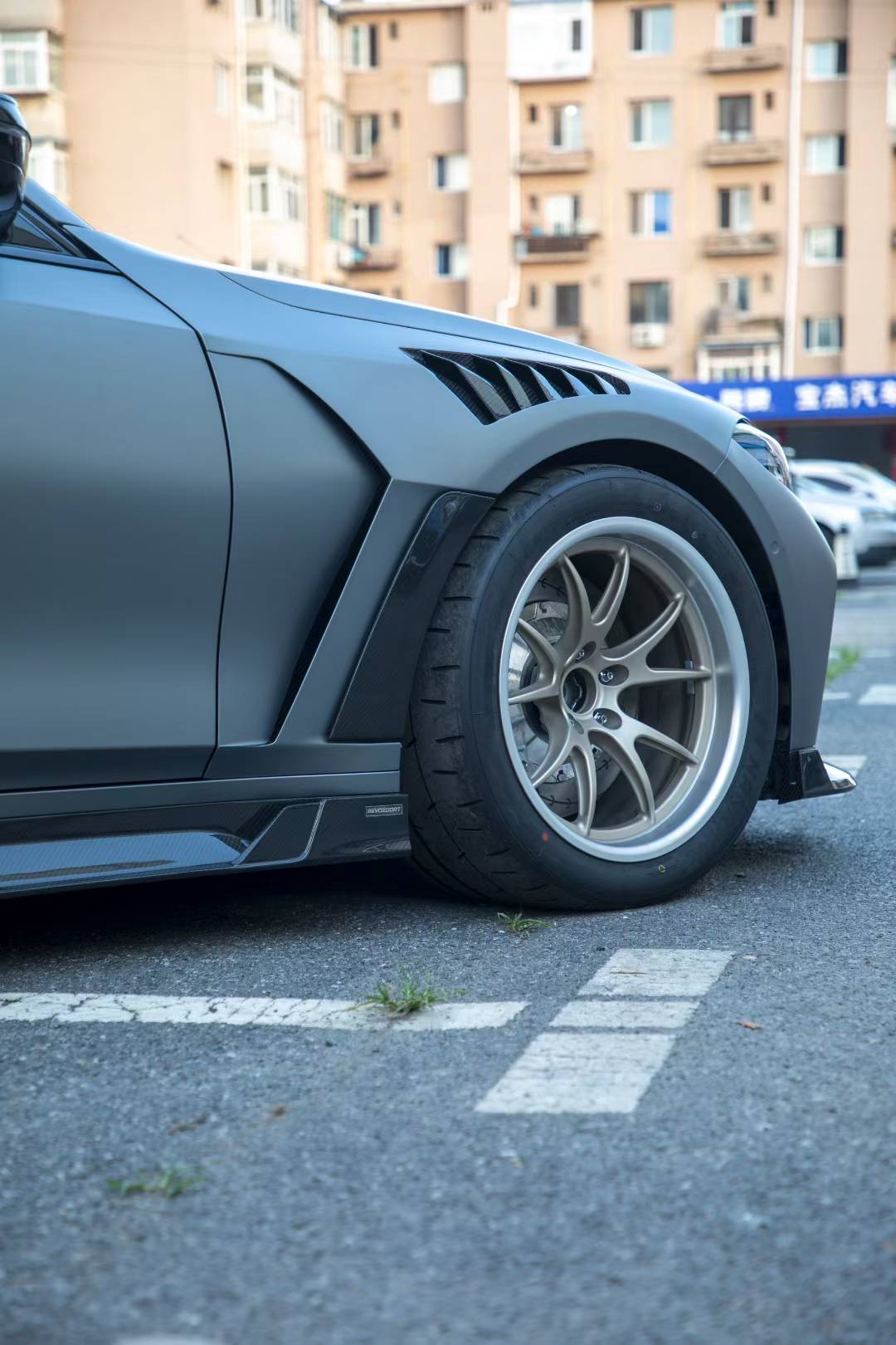BMW M3 G80 RevoZport carbon side fenders and side skirts detail