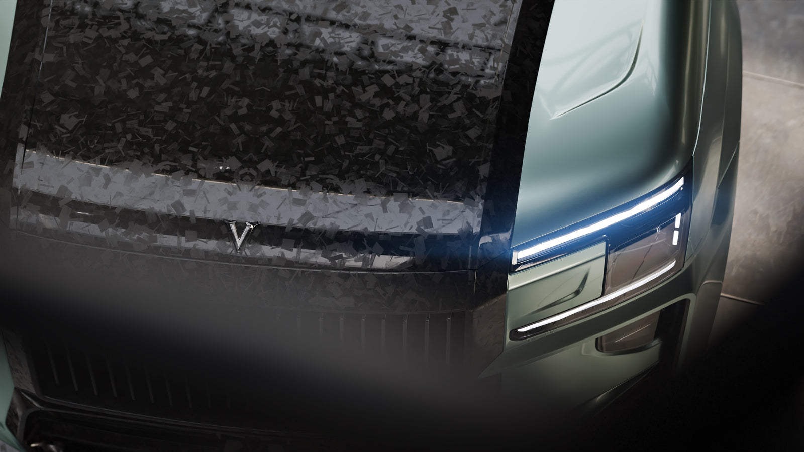 Forged-carbon hood and headlight detail on the Veloire 9X.